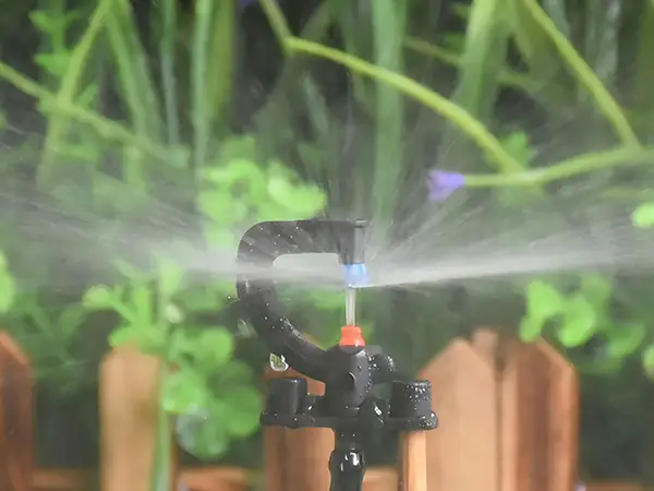 An atomizing G-type refractive micro sprinkler is spraying water.