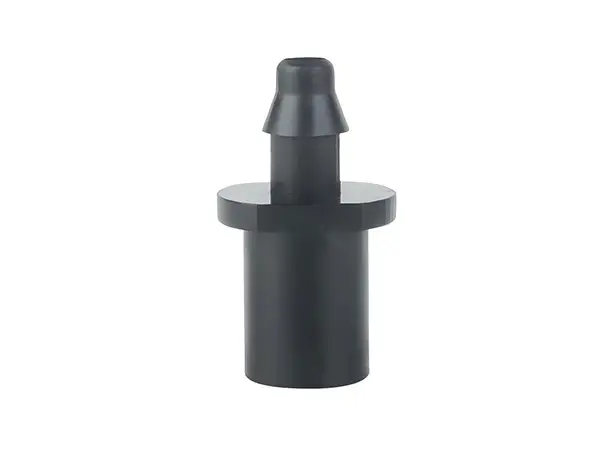 A black irrigation internal cone external barbed connector