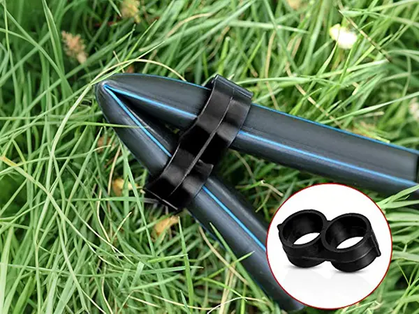 A drip line end cap folds and locks the end of the pipe.